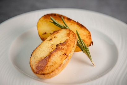 Farm potatoes with melted butter